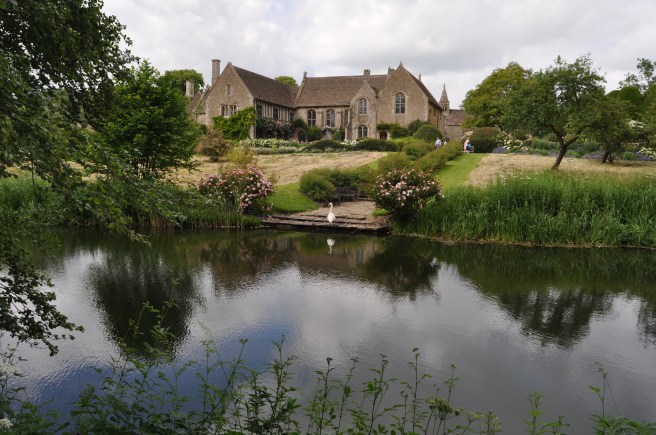 View of Great Chalfield Manor across the fish pond